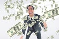 business man with falling money Royalty Free Stock Photo