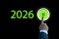 Business man finger starting the new year 2026 pressing the button Royalty Free Stock Photo
