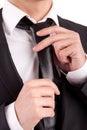Business man fixing his tie Royalty Free Stock Photo