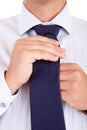 Business man fixing his tie Royalty Free Stock Photo