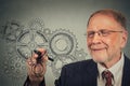 Business man with gears and ideas Royalty Free Stock Photo