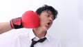 Business man getting punch with boxing glove Royalty Free Stock Photo