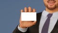 Businessman holding business card in his hand, cartoon 3D illustration Royalty Free Stock Photo