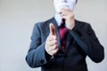 Business man giving dishonest handshake hiding in the mask - Business fraud and hypocrite agreement Royalty Free Stock Photo