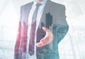 Business man giving hand for handshake , city skyline background Royalty Free Stock Photo