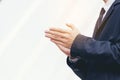 Business man greeting clapping hands. Success business concept