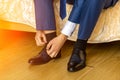 Business man or groom dressing up with classic elegant shoes Royalty Free Stock Photo