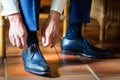 Business man or groom dressing up with classic elegant shoes Royalty Free Stock Photo