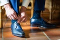 Business man or groom dressing up with classic elegant shoes Royalty Free Stock Photo