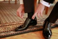 Business man or groom dressing up with elegant shoes Royalty Free Stock Photo