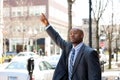 Business Man Hailing a Taxi Cab Royalty Free Stock Photo