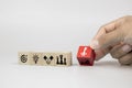 Business man hand choose cube wooden toy blog with the key on business strategy icon of strategic plannig and organization managem