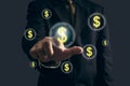 Business man hand is pointing or pressing button with dollar financial icon symbol on virtual screen. Business concept and Royalty Free Stock Photo