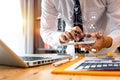 Business man hand working with laptop computer, tablet and smart phone Royalty Free Stock Photo