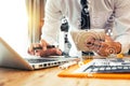 Business man hand working with laptop computer, tablet and smart phone Royalty Free Stock Photo