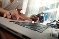 Business man hand working on laptop computer on wooden desk Royalty Free Stock Photo