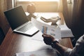 Business man hand working at office with laptop and documents on Royalty Free Stock Photo