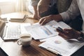 Business man hand working at office with laptop and documents on Royalty Free Stock Photo