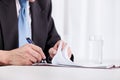 Business man hand writing on paper Royalty Free Stock Photo