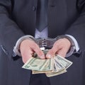 Business man in handcuffs arrested for bribe Royalty Free Stock Photo