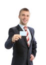 Business man handing a blank business card Royalty Free Stock Photo