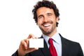Business man handing a blank business card Royalty Free Stock Photo