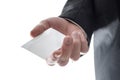 Business man handing a blank visiting card Royalty Free Stock Photo