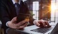 business man hands busy using cell phone at office desk Royalty Free Stock Photo