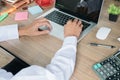 Business man hands holding a credit card and using laptop Royalty Free Stock Photo