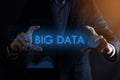 Business man hands holding inscription BIG DATA with different graphs on the background.automation technology concept Royalty Free Stock Photo