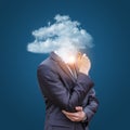 Business man with head in the clouds. Royalty Free Stock Photo