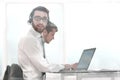 Business man in headphones sitting at his Desk Royalty Free Stock Photo