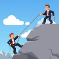 Business man helping friend climbing up with rope Royalty Free Stock Photo