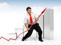 Business man helping a red graph arrow Royalty Free Stock Photo