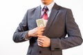 Business man hiding money in jacket pocket Royalty Free Stock Photo