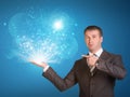 Business man hold magic light in hand Royalty Free Stock Photo