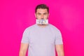 Business man hold money on pink studio isolated background. Rich man in t-shirt with money dollar bills. Successful