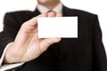 Business man holding blank businesscard