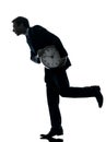 Business man holding clock robbing time silhouette