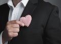 business man holding a cloth heart. Royalty Free Stock Photo