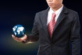 Business man holding earth globe in hand Royalty Free Stock Photo