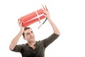 Business man holding fire extinguisher with empty Royalty Free Stock Photo