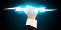 Business man holding glowing lightning bolt in his hands