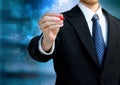 Business man holding a red pen Royalty Free Stock Photo