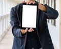 Business man holding and shows touch screen tablet pc Royalty Free Stock Photo