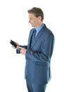 Business man holding a smart phone Royalty Free Stock Photo