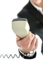 Business man holding telephone receiver Royalty Free Stock Photo