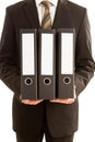 Business man holding three folders