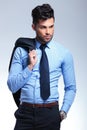 Business man holds jacket on shoulder Royalty Free Stock Photo