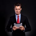 Business man holds tablet Royalty Free Stock Photo